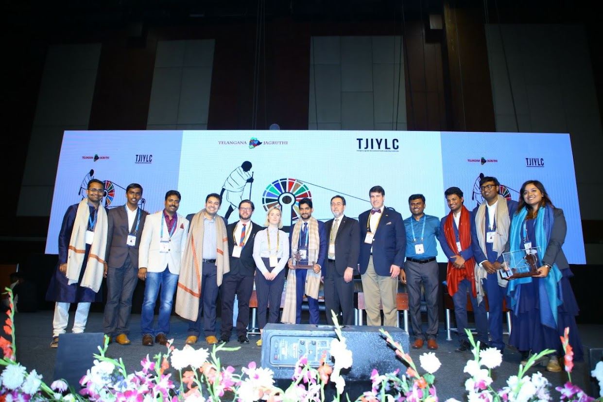 Organisers and speakers on stage at the close of TJIYLC 2019